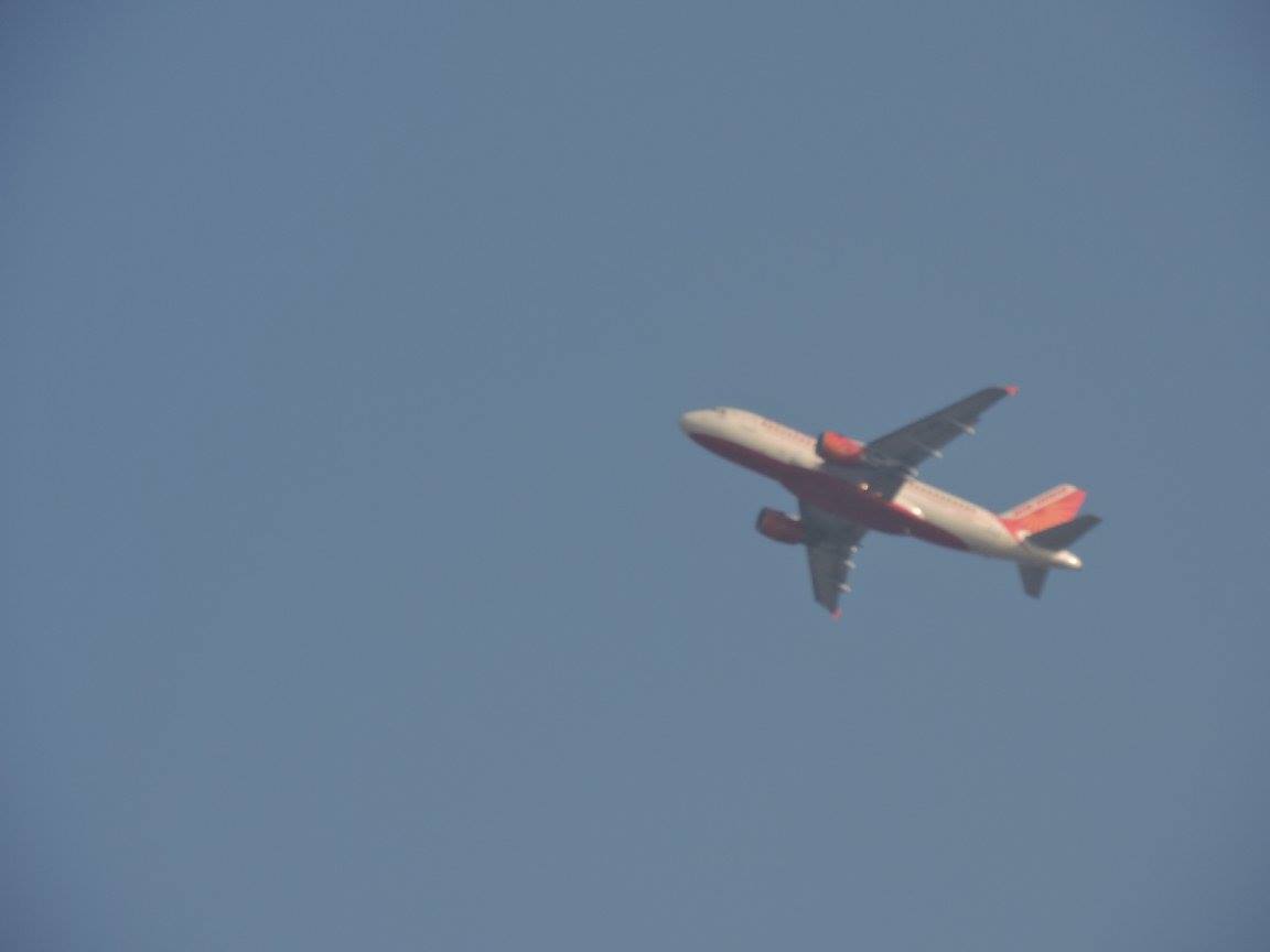 An Aeroplane flying over Khajuraho
