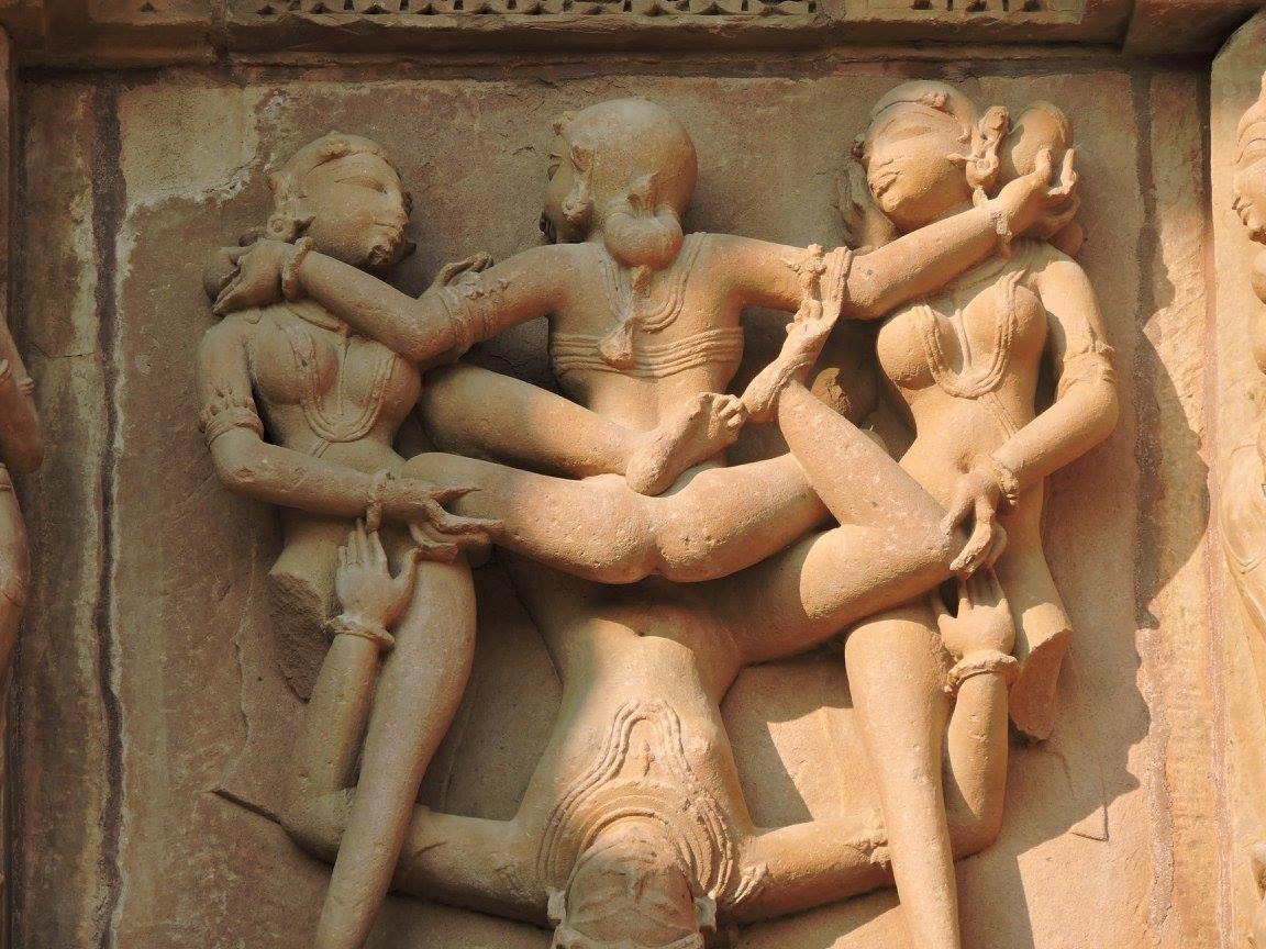 Statue of love making in Sheershashan in Khajuraho